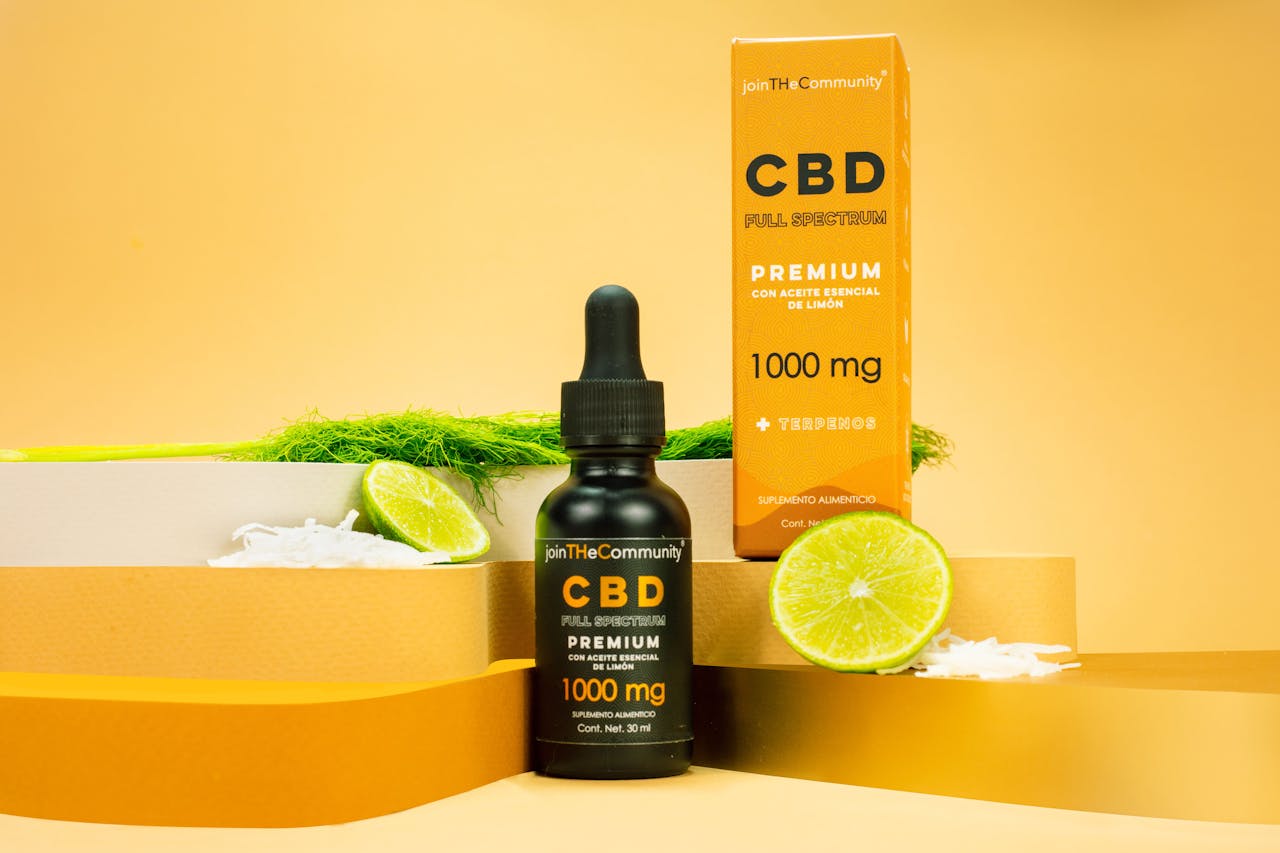 about-us Premium CBD full spectrum serum with lime essential oil displayed on a vibrant yellow background.